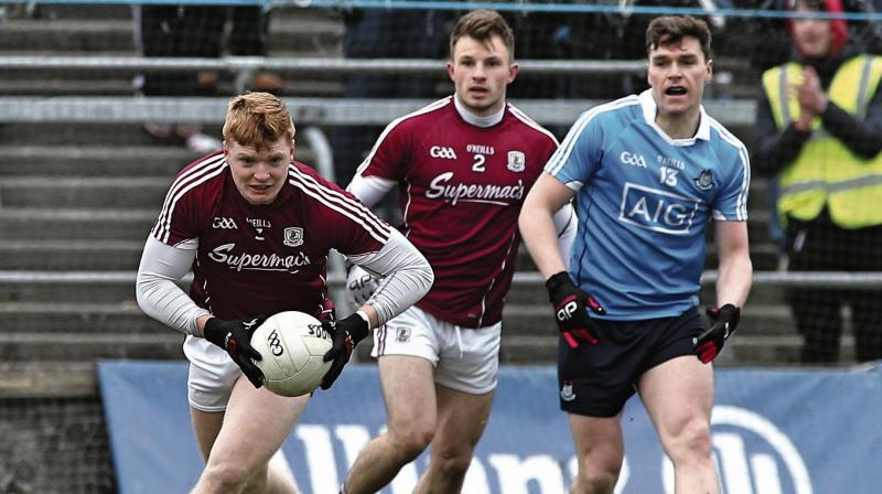 Galway's Seán Andy Ó Ceallaigh who has been a big addition to the county football squad this year. He is pictured with team-mate Eoghan Kerin in action against Dublin's Paddy Andrews.