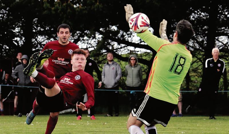 This acrobatic effort from Athenry FC's Ryan Shaughnessy whistled past Galway Hibernians goalkeeper Padraig Lally's post when the teams drew 2-2 in the Galway Premier League at Moanbaun on Sunday morning. Athenry's Conor Cannon is in the background. EIREFOTO