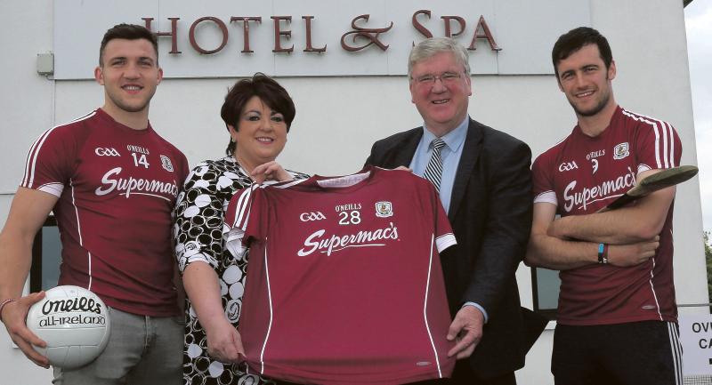 Galway football captain Damian Comer, Una and Pat McDonagh of Supermac', and Galway hurling captain David Burke at the announcement of Supermac's and Galway GAA's five-year sponsorship deal at the Lough Rea Hotel and Spa. Photo: Hany Marzouk.