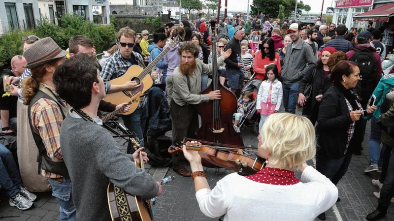 The Invisiible Jug Band performing at the Westend Street Feast at Raven Terrace last year.