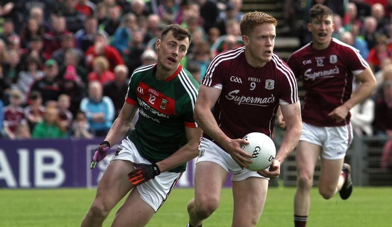 Galway’s Ciarán Duggan breaking away from Mayo’s Diarmuid O'Connor during Sunday's Connacht Senior Football Championship quarter final at MacHale Park. Photo: Enda Noone.