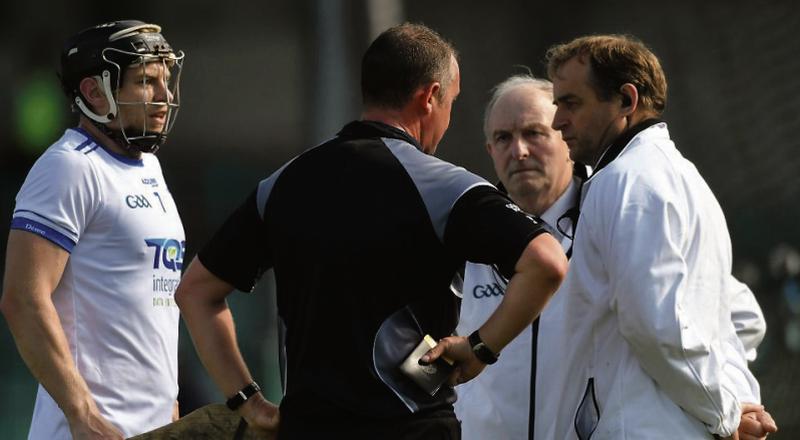 Galway referee Alan Kelly consulting with his umpires before awarding Tipperary a controversial goal in Sunday's Munster hurling championship clash with Waterford at the Gaelic Grounds.