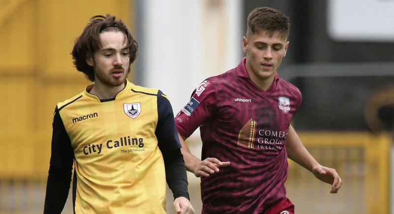 Galway United's Aaron Conway gives chase to Dylan McGlade of Longford Town during Friday night's First Division tie at Eamonn Deacy Park. Photo: Joe O'Shaughnessy.