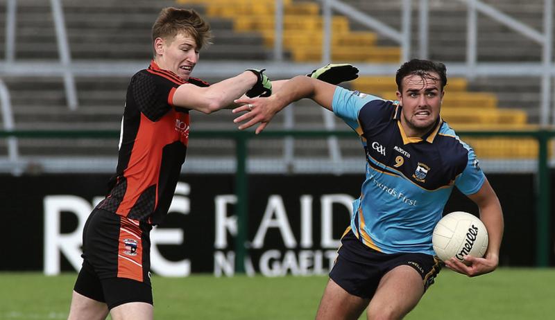 John Maher of Salthill Knocknacarra comes under pressure from Barna's Conor Curran during Sunday's senior championship tie at Pearse Stadium. Photo: Joe O'Shaughnessy.