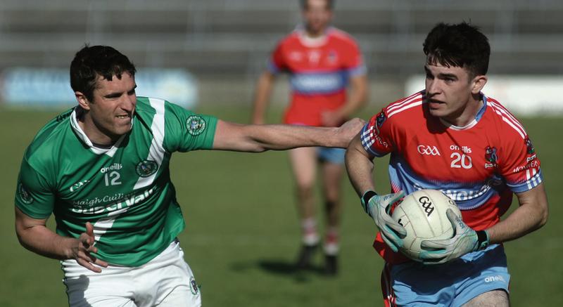 Monivea-Abbey’s Brian Moran eyes up his options against Moycullen's Diarmuid Lee during Sunday's senior football championship tie at Pearse Stadium. Photos: Enda Noone.