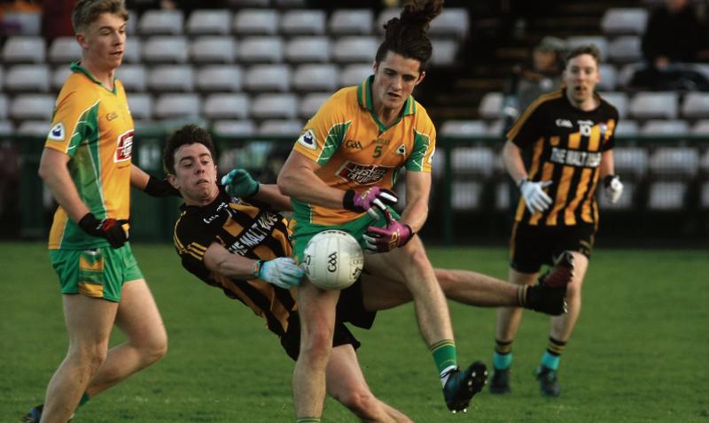 Corofin’s Kieran Molloy and Mountbellew-Moylough’s Ger Donaghue tussling for possession during Sunday's County Football Final at Pearse Stadium. Photos: Enda Noone.