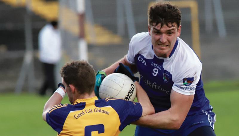 Clonbur captain Cathal Burke tussling for possession with Kilglass Gaels' Shane McCormack during Sunday's Connacht Junior football semi-final at Tuam Stadium. Photos: Brian Harding.