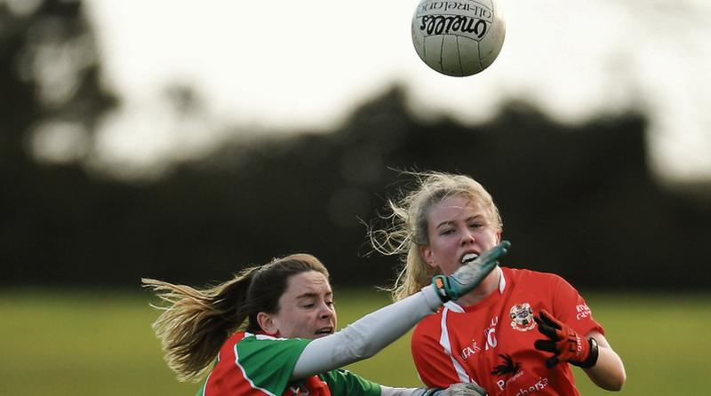 Lynsey Noone of Kilkerrin-Clonberne is challenged by Sadhbh Larkin of Carnacon during the Connacht Ladies Senior Club Football Final in Ballyhaunis on Sunday. Photos: Eóin Noonan/Sportsfile.