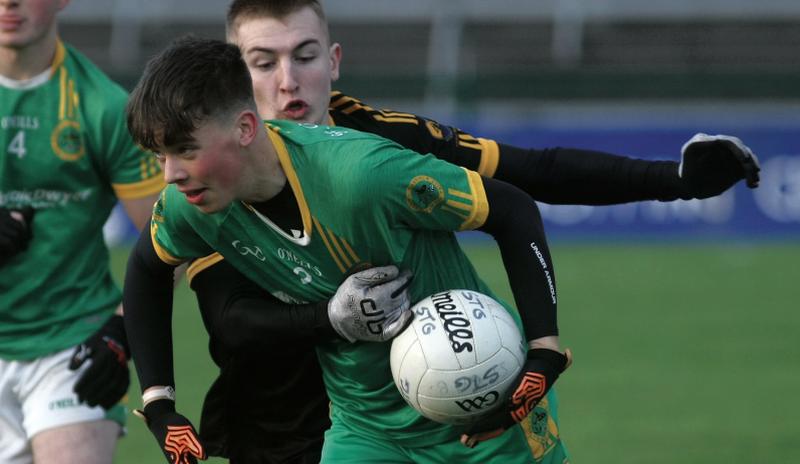 St Gabriel's Cathal Dillon tries to break past the challenge of Naomh Anna's Oisin Mac Donncha during Saturday's County U20 B Football Championship Final at Pearse Stadium. Photos: Enda Noone.