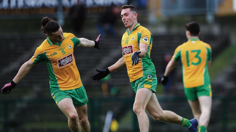 A delighted Jason Leonard celebrates with Kieran Molloy after scoring the first of his two goals for Corofin in Sunday's Connacht Club senior football semi-final against Clann na nGael at Dr Hyde Park.