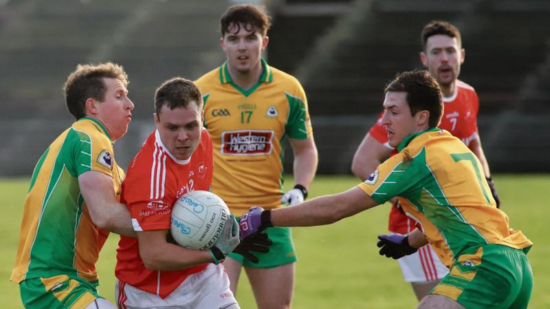 Ballintubber's Alan Plunkett comes under pressure from Corofin's Gary Sice and Dylan Wall during Sunday’s Connacht Club Senior Football Final at MacHale Park. Photo: Brian Harding.