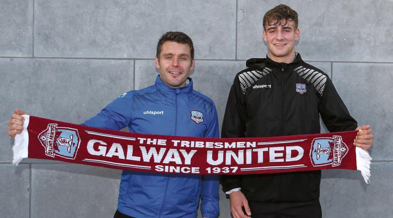 Galway United manager Alan Murphy with Oranmore's Adam Rooney after the defender signed a new contract with the club.