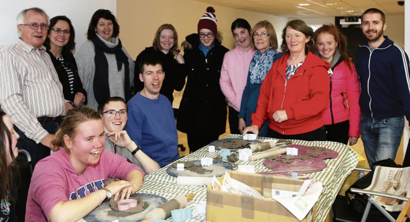 Billy and Patrick Mulvihill of Amicitia Social Hub pictured with Vision Arch Club members, managers, tutors and volunteers. Photos: EIREFOTO