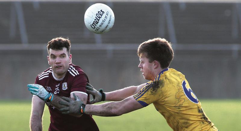 Galway's Johnny Duane tussling for possession with Niall Daly of Roscommon during Sunday's Connacht FBD League Final at Tuam Stadium. Photos: Joe O'Shaughnessy.