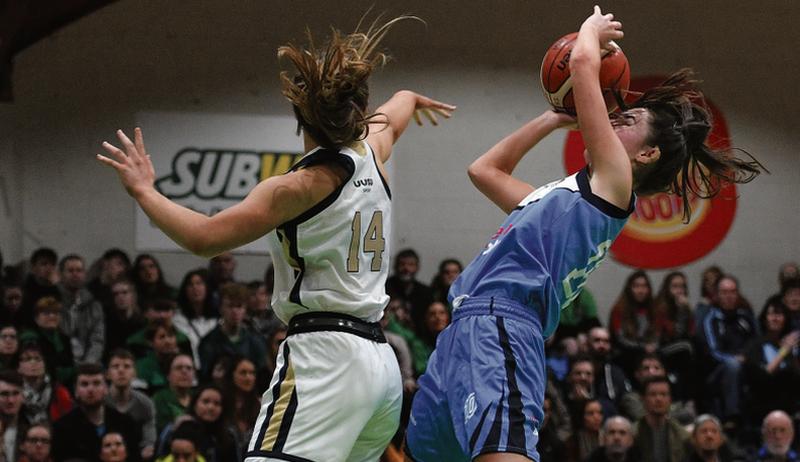 Catherine Connaire, seen here in action against Alex Mulligan of Ulster University Elks during the Women’s Division One National Cup Final last month, finished as top scorer with 20 points in Maree's game with Trinity on Saturday.