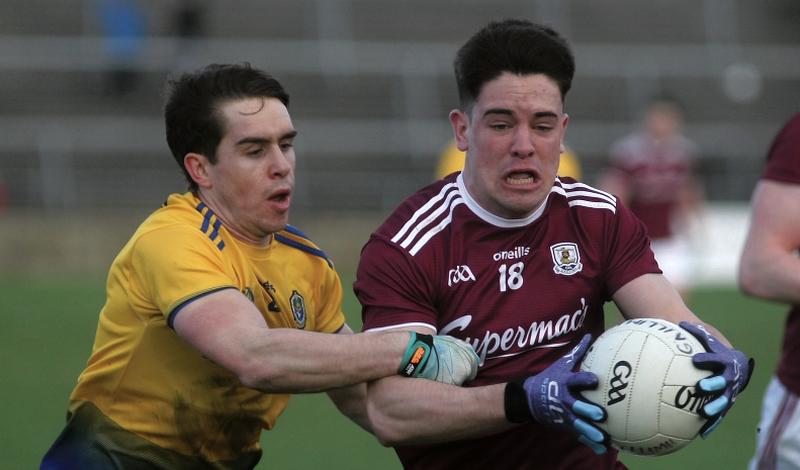 Galway’s Sean Kelly comes under pressure from Roscommon’s David Murray during Saturday's National Football League tie at Pearse Stadium. Photo: Enda Noone.