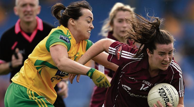Galway's Roisin Leonard tries to escape the clutches of Donegal's Nicole McLoughlin during the NFL Division 1 semi-final at Pearse Park on Saturday. Photos: Matt Browne/Sportsfile