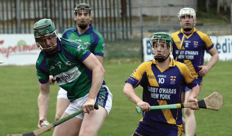 Tynagh/Abbey-Duniry defender Gary McHugo gains possession ahead of Loughrea's Ian Hanrahan during Sunday's senior hurling champiobnship tie at Duggan Park. Photos: Joe Keane.