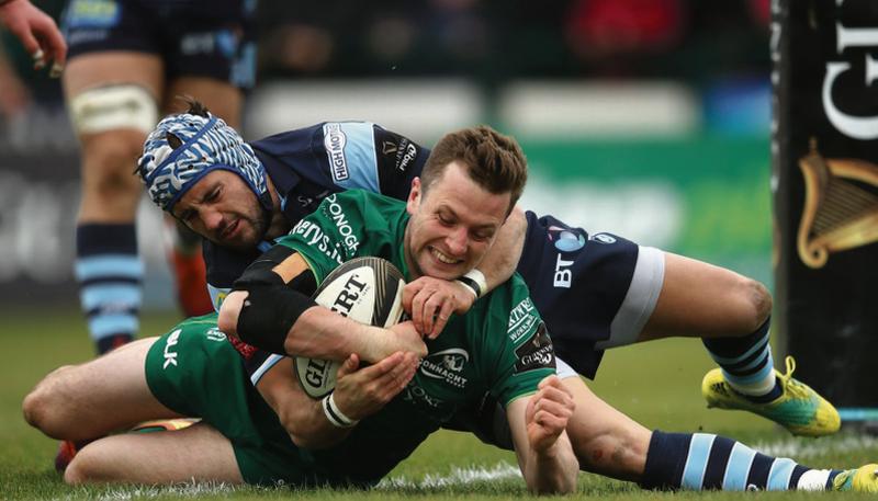Connacht out-half Jack Carty scores a terrific second-half try despite the best efforts of Cardiff Blues' Matthew Morgan during Saturday's PRO14 clash at the Sportsground.