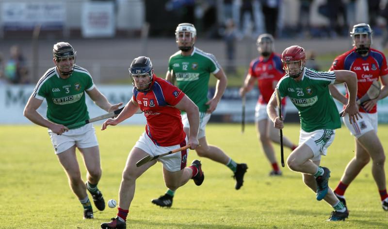 St Thomas' Bernard Burke on the ball against Liam Mellows' Sean Morrissey and Patrick Prendergast in last year's group championship clash. The 2018 county finalists will meet again at Kenny Park on Sunday.