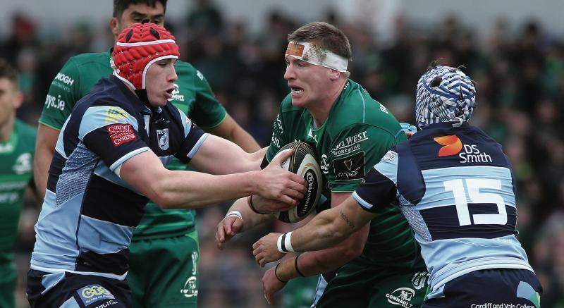Connacht's Gavin Thornbury carrying the battle to Seb Davies and Matthew Morgan of Cardiff Blues during Saturday's PRO14 clash at the Sportsground. Photos: Joe O'Shaughnessy.