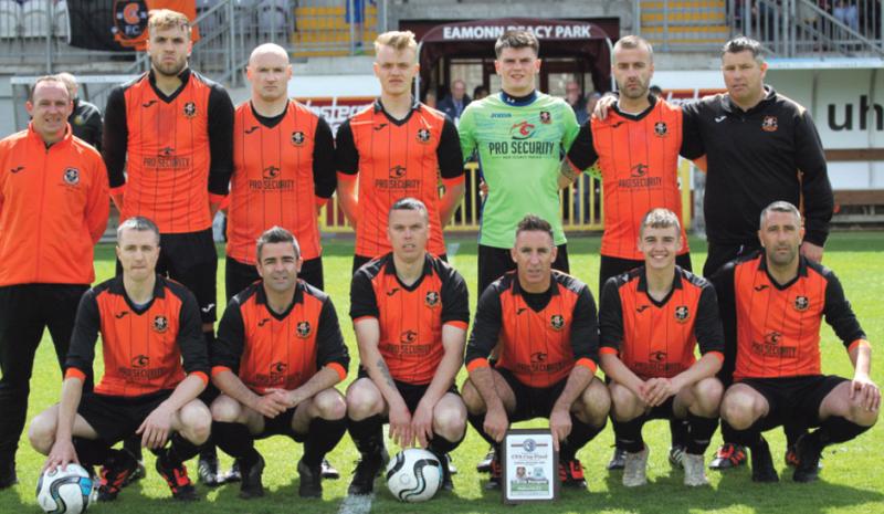 The Corrib Rangers team which captured the Connacht Junior Cup. Back row, from left: Ollie Rafferty (assistant manager), Stephen Gilmore, David Goldbey, Maceik Rydzewski, Tadhg O’Malley, Martin O’Connor, and Brendan O’Connor (manager). Front: Simon Walsh, Sean Keogh, Geoffrey Power, John O’Brien (captain), Mark Wynne, and Jimmy Jennings. Photos: Noel Kennedy.
