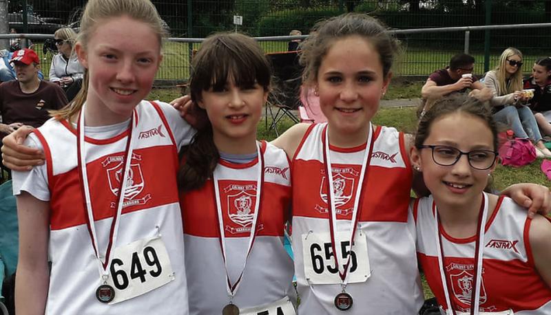 The GCH relay team of Tara Keane, Caitlin Podmore, Thea Power, and Eireann Greene.