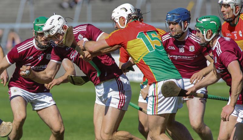 Galway's Gearoid McInerney is tackled by Carlow's Chris Nolan in Pearse Stadium last weekend. Photos: Joe O'Shaughnessy.