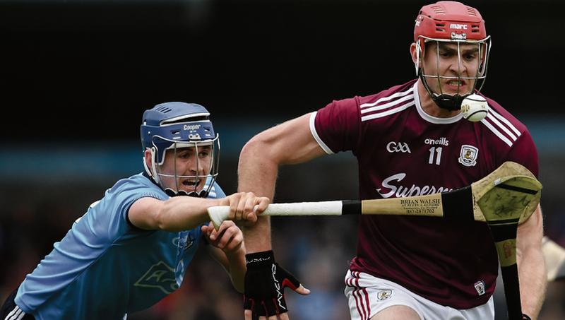 Galway's Jonathan Glynn tries to break away from Seán Moran during Saturday's Leinster hurling championship round-robin tie at Parnell Park. Photo:Ramsey Cardy/Sportsfile.