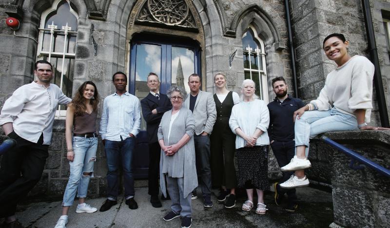 Director Garry Hynes (foreground) and cast. From left’; Marty Rea, Julia McDermott, Jude Akuwudike, Bill Irwin, Rory Nolan, Kate Kennedy, Marie Mullen, Aaron Monaghan and Grace Byers.