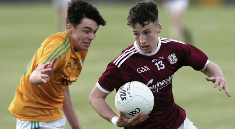 Galway's Nathan Grainger takes on Leitrim's James Clinton during Friday evening's Connacht minor football championship tie at Tuam Stadium. Photo: Joe O'Shaughnessy.