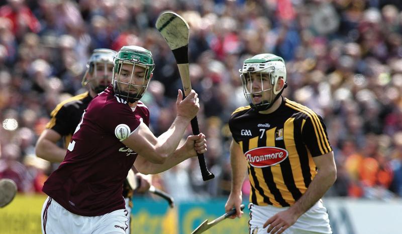 Galway's Adrian Tuohey aims for the posts as Kilkenny's Paddy Deegan gives chase during Sunday's Leinster hurling championship tie at Nowlan Park. Photo: Joe O'Shaughnessy.