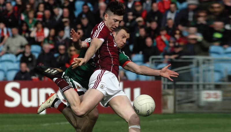 Galway's Johnny Heaney scoring the matchwinning goal despite the best efforts of Mayo's Keith Higgins in last year's Connacht football championship.